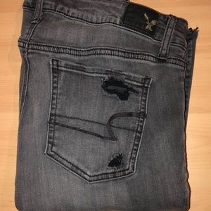 Ripped Black American Eagle Super Low Jegging